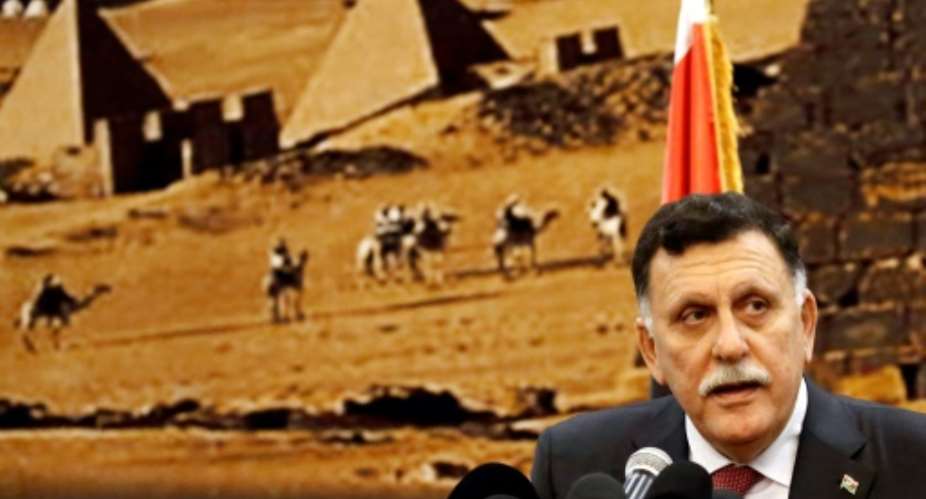 Libya's unity government chief Fayez al-Sarraj at a joint press conference  in the Sudanese capital on August 27, 2017.  By ASHRAF SHAZLY AFP