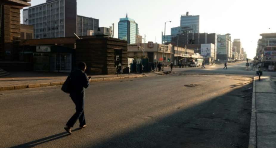 Life has become a daily grind for most Zimbabweans with blackouts and devastated livelihoods.  By Jekesai NJIKIZANA AFP
