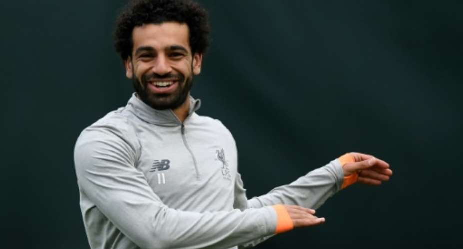 Liverpool's Egyptian midfielder Mohamed Salah attends a training session at the team's Melwood training complex in Liverpool, north west England, on April 23, 2018 on the eve of their first-leg UEFA Champions League semi-final football match against Roma..  By Paul ELLIS AFP