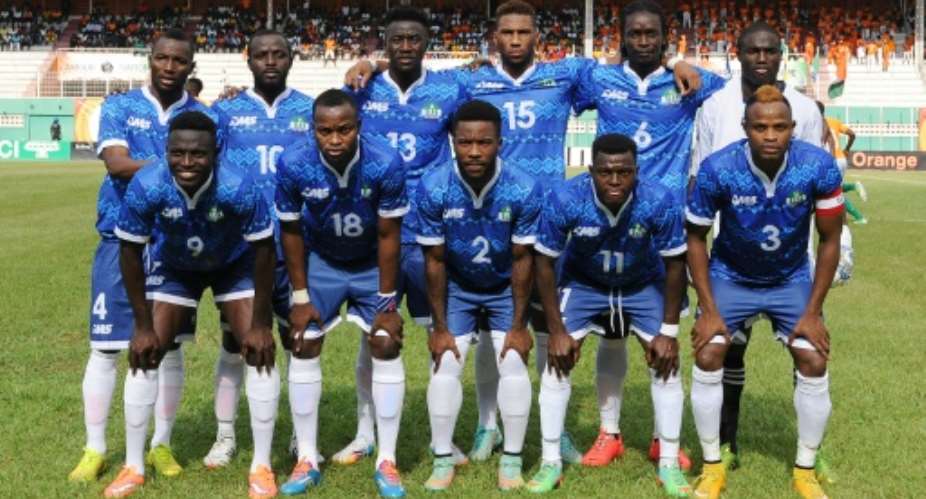 Sierra Leone's national football team players pose prior to an African Cup of Nations 2015 qualifying football match Ivory Coast vs Sierra Leone on November 14, 2014 at the Houphouet Boigny stadium in Abidjan.  By Sia Kambou AFPFile