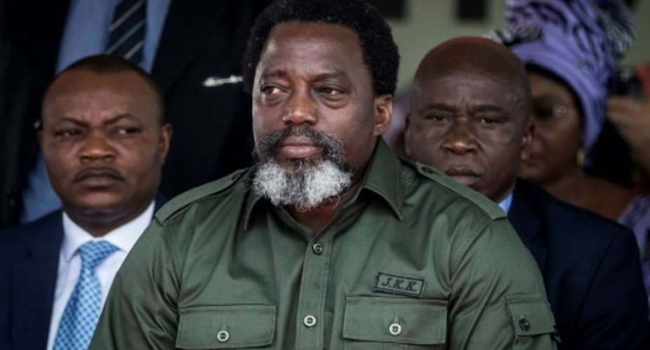 Longtime leader Joseph Kabila must step down after next month's election after leading the DR Congo for 18 years.  By JOHN WESSELS AFP