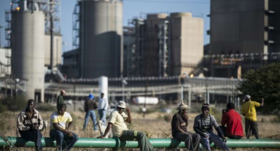 Around 6,000 jobs are at risk as platinum giant Lonmin plans to close some of its shafts in South Africa.  By Mujahid Safodien AFPFile