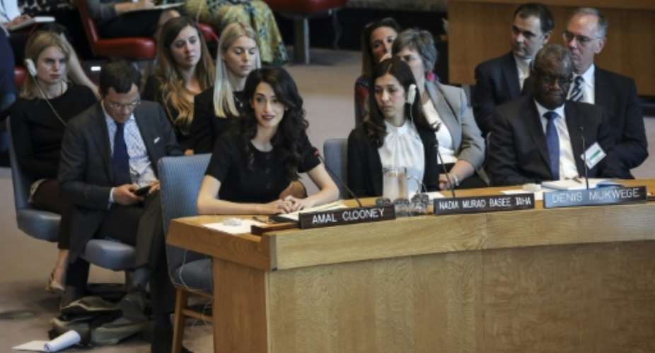L-R Human rights lawyer Amal Clooney joins 2018 Nobel Peace Prize laureates Nadia Murad and Denis Mukwege in urging the United Nations to act against sexual violence in conflicts.  By Drew Angerer GETTYAFP