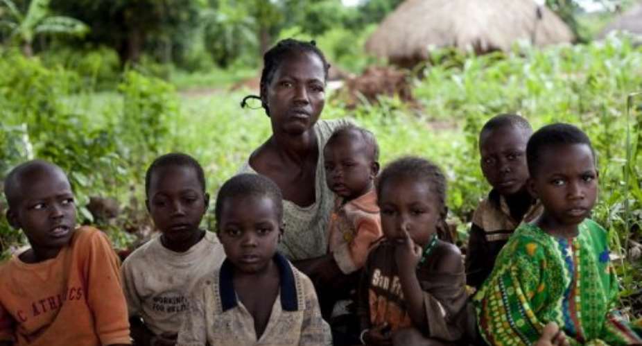 A family who fled the town of Zangia after an attack by rebels of the Lord Resistance Army in 2010.  By Trevor Snapp (AFP/File)
