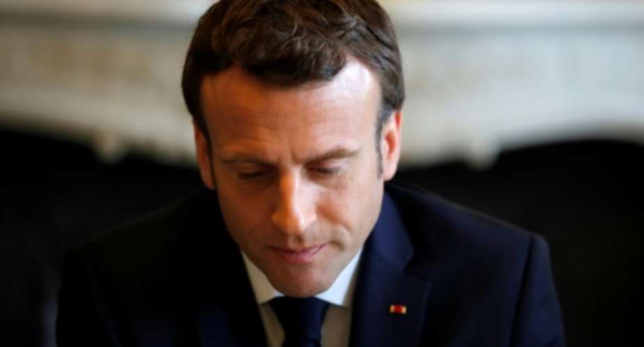 Macron caused disappointment among genocide survivors by turning down an invitation to attend this weekend's genocide commemorations in Rwanda.  By PHILIPPE WOJAZER POOLAFP