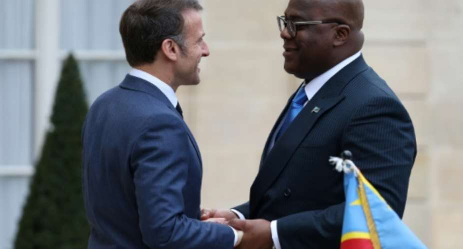 Macron compared the importance of the DRC's territorial integrity to Ukraine.  By ALAIN JOCARD AFP