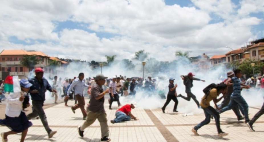 Madagascan security forces fired tear gas to break up a protest by supporters of losing presidential candidate Marc Ravalomanana, who claims fraud in last month's election.  By Mamyrael AFP