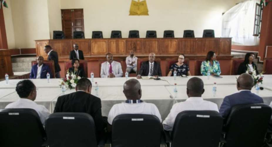 Madagascar opposition candidates meet with magistrates from the Constitutional court on Wednesday.  By RIJASOLO (AFP)
