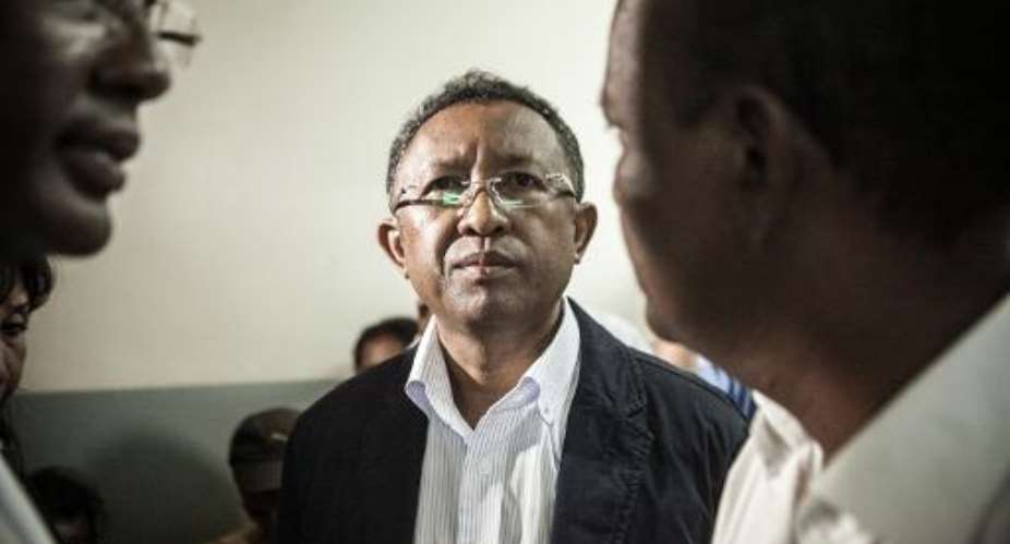 Madagascar's President Hery Rajaonarimampianina C, pictured on January 24, 2014, defended himself through his lawyers, denouncing a recent vote to impeach him as an attempted institutional coup d'etat.  By Rijasolo AFPFile