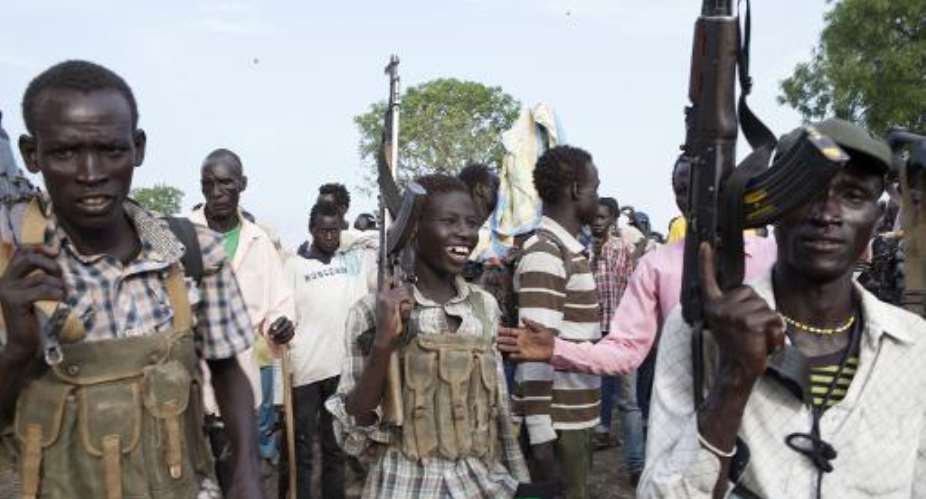 Members of the White Army, a South Sudanese anti-government militia, attend a rally in Nasir on April 14, 2014.  By Zacharias Abubeker AFPFile
