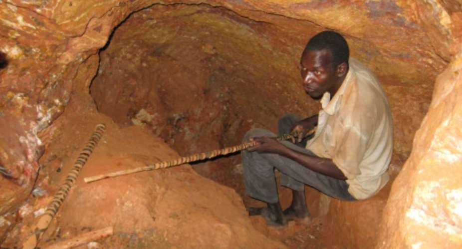 Makeshift gold miners often work in high-risk conditions where safety rules are ignored -- collapses of mining 'holes' are a big peril.  By FANNY PIGEAUD AFPFile