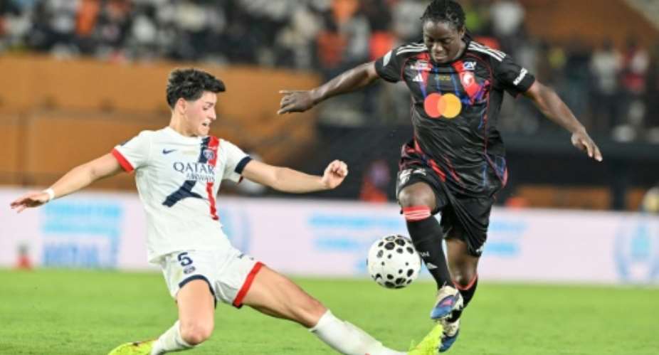 Malawi captain Tabitha Chawinga (R) playing for Lyon..  By Issouf SANOGO (AFP)