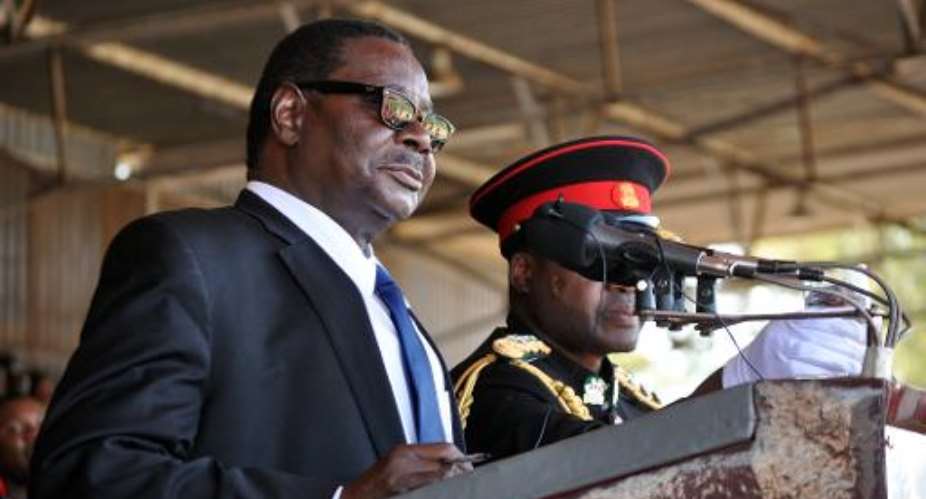 Newly elected Malawian President Arthur Peter Mutharika delivers a speech during his official inauguration as Malawi's new President, at the Kamuzu stadium in Blantyre on June 2, 2014.  By Amos Gumulira AFPFile