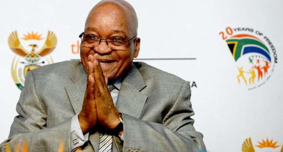 South Africa President Jacob Zuma gestures during the opening ceremony of the first national Broad-Based Black Economic Empowerment B-BBEE summit in Midrand on October 3, 2013.  By Stephane de Sakutin AFPFile