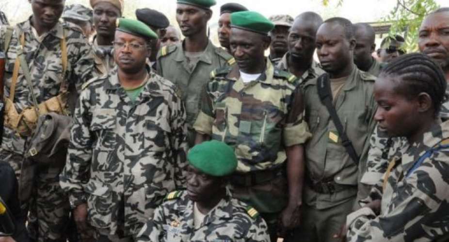 Mali junta leader Captain Amadou Sanogo C poses surrounded by his fellow soldiers.  By Habibou Kouyate AFPFile
