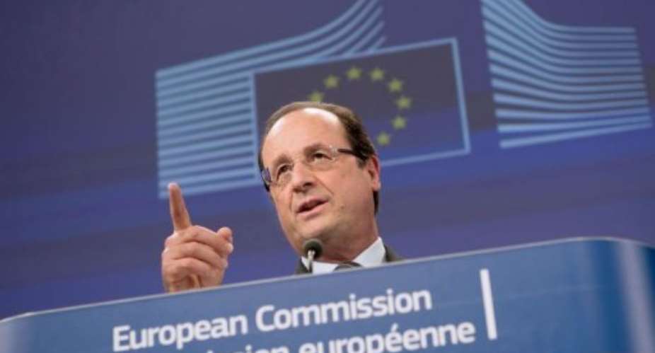 Frances President Francois Hollande speaks at a press conference on May 15, 2013 at the EU Headquarters in Brussels.  By Bertrand Langlois (AFP)