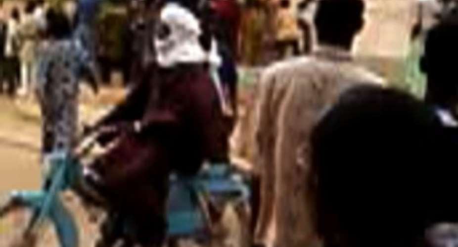 A still from a video taken with a mobile phone shows a convoy of Islamists patrolling the streets of Gao on June 26.  By  (AFP/File)