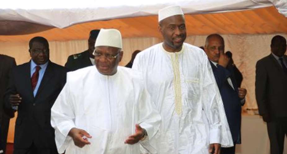 Malian President Ibrahim Boubacar Keita 2nd L and his new Prime Minister Moussa Mara walk to a cabinet meeting in Bamako on April 16, 2014.  By Habibou Kouyate AFPFile