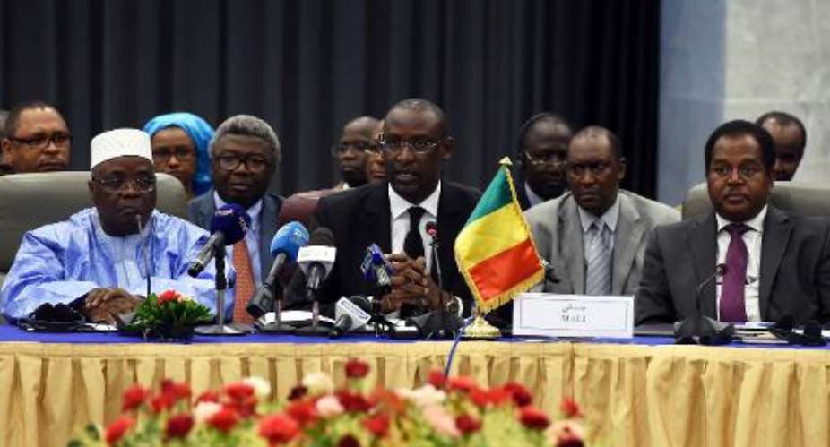 Malian Foreign Minister Abdoulaye Diop C chairs a meeting on peace talks attended by Mali's various warring factions, on July 16, 2014 in the Algerian capital Algiers.  By Farouk Batiche AFPFile