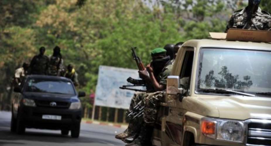 Malian soldiers patrol the streets of Bamako.  By Issouf Sanogo (AFP/File)