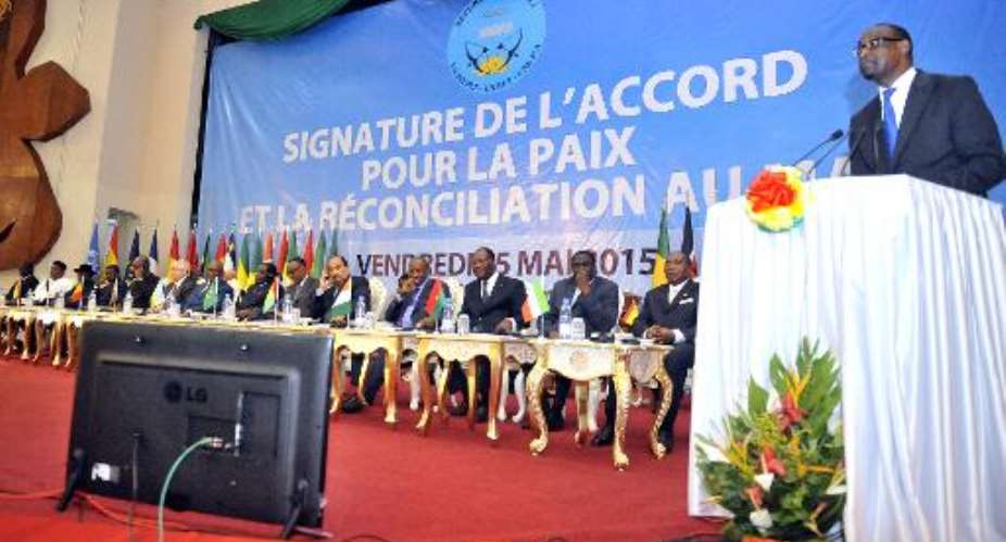 Malian Foreign Affairs Minister Abdoulaye Diop R delivers a speech during a ceremony to sign a peace accord between Mali's government and several armed groups on May 15, 2015 in Bamako.  By Habibou Kouyate AFPFile