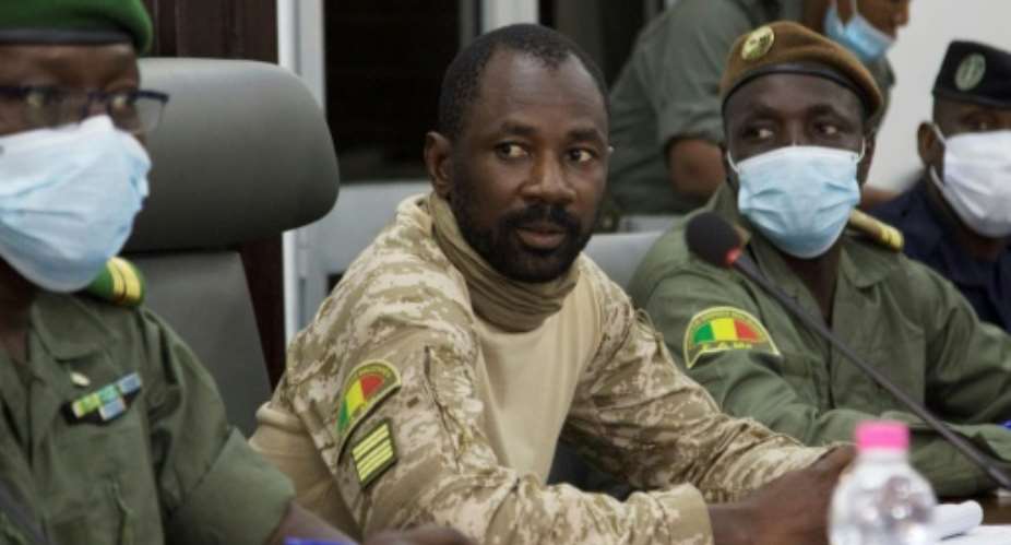 Mali's junta leader, Colonel Assimi Goita, has vowed to install an 18-month transition government.  By ANNIE RISEMBERG AFPFile