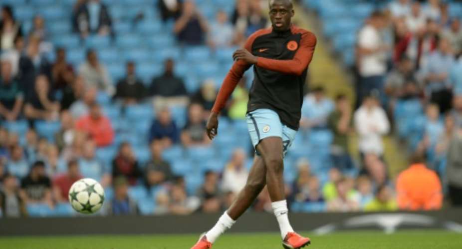 Manchester City's Ivorian midfielder and captain Yaya Toure warms up ahead of the UEFA Champions League match against Steaua Bucharest at the Etihad Stadium in Manchester on August 24, 2016.  By Oli Scarff AFPFile