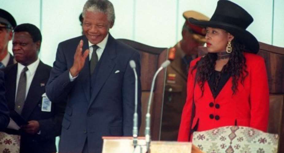 Zinani Mandela with her father Nelson Mandela at his presidential inauguration in Pretoria on May 10, 1994.  By Walter Dhladhla AFPFile