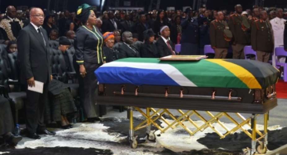 Mandela died on December 5, 2013 and was buried at his home village in Qunu on December 15 at a funeral attended by presidents, royalty and several celebrities..  By ODD ANDERSEN POOLAFPFile