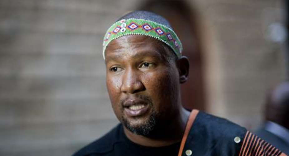Mandla Mandela, Nelson Mandela's oldest grandson, arrives for the opening of the South African parliament in Cape Town on June 17, 2014.  By Rodger Bosch AFPFile
