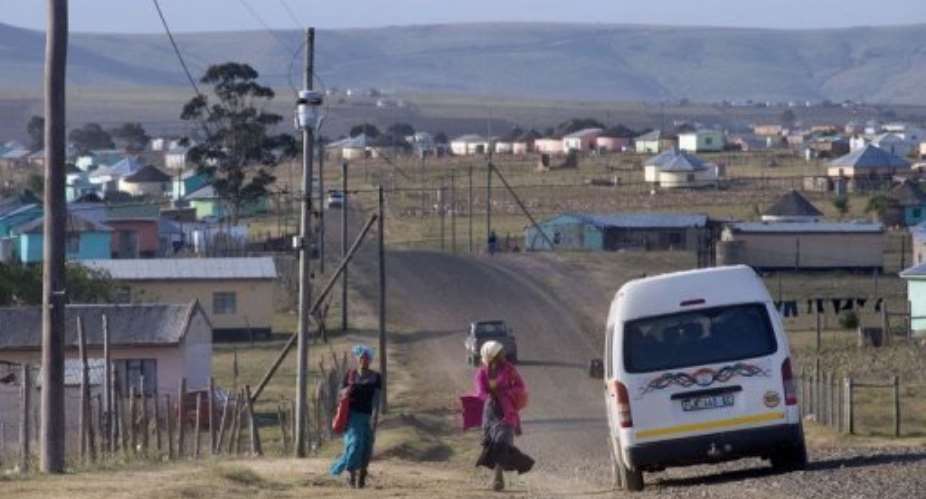 A road through the village of Qunu, South Africa, where Mandela grew up.  By Rodger Bosch AFPFile