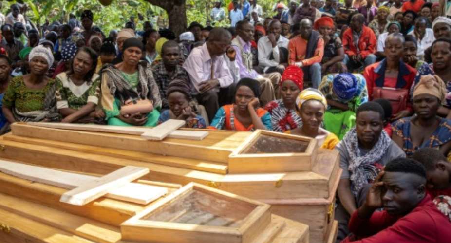 Many of the victims of the Uganda school attack were buried on Sunday.  By Stuart Tibaweswa AFPFile