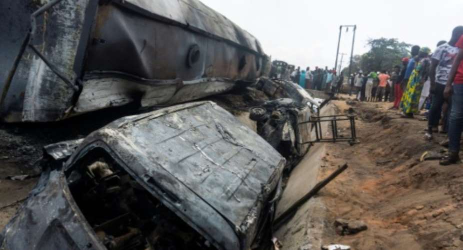 Many other vehicles were caught in the blaze when the fuel truck overturned.  By Haruna Yahaya AFP