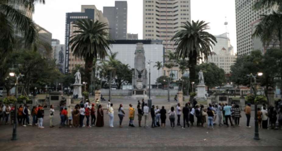 Many people had to wait to vote in South Africas landmark general election, which could see the ruling ANC lose its absolute majority for the first time since 1994.  By GIANLUIGI GUERCIA (AFP)