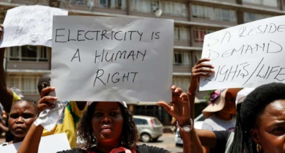 Many South Africans are furious at the blackouts, which can last hours at a time.  By Phill Magakoe AFP