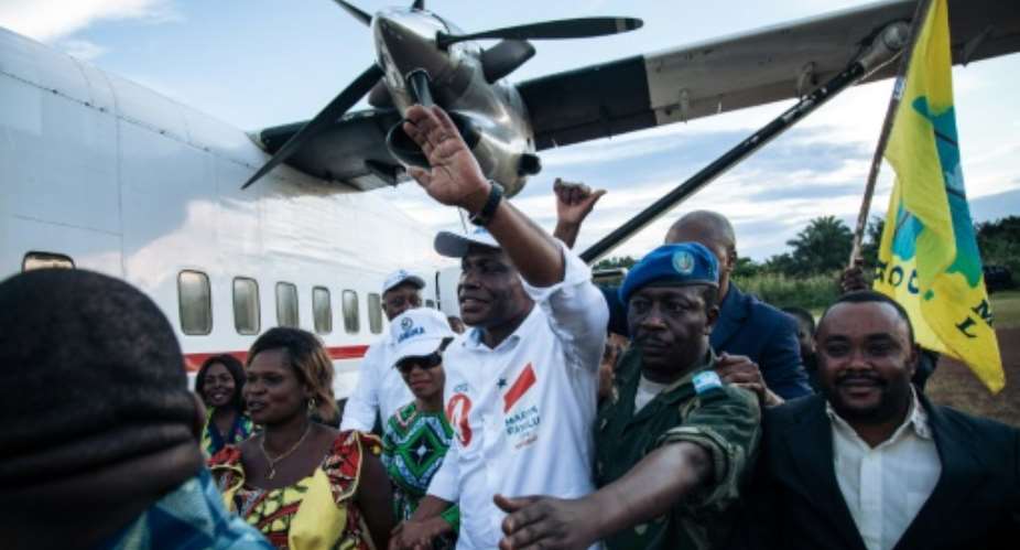Martin Fayulu C, who is vying to replace President Joseph Kabila in the pivotal December 23 polls, was greeted by thousands at a small airport near the restive eastern city of Beni in North Kivu.  By ALEXIS HUGUET AFP