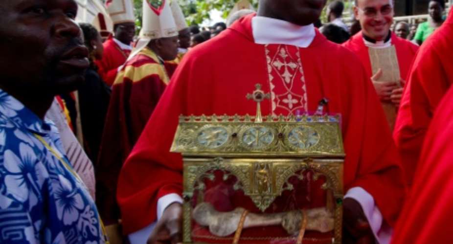 Martyrs Day commemorates 45 Anglican and Catholic converts to Christianity who were killed in the 1880s by Mwanga II, the king of Buganda, now part of Uganda. A bone of one of the martys is a revered relic.  By MARC HOFER AFPFile