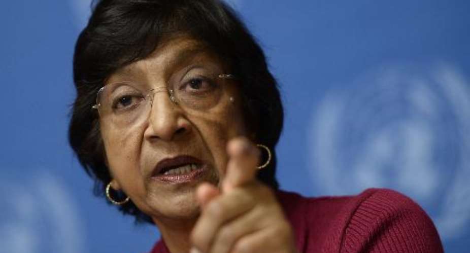 UN High Commissioner for Human Rights Navi Pillay gives a press conference on December 2, 2013 at the United Nations offices in Geneva.  By Fabrice Coffrini AFP