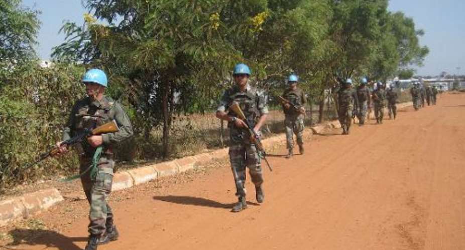 UN peacekeepers from India patrol a road in Juba, South Sudan, on December 16, 2013.  By  UNMISSAFP