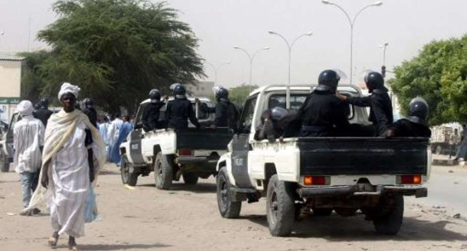 Police forces patrol the streets of Nouakchott, Mauritania on November 5, 2003.  By Georges Gobet AFPFile