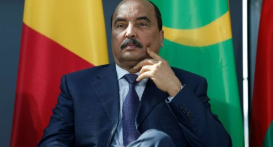 Mauritanian President Mohamed Ould Abdel Aziz, pictured in April 2017, called for a referendum after the Senate rejected the abolition of their own chamber, but many critics say the referundum is just preparation for Aziz's third presidential term.  By GEOFFROY VAN DER HASSELT AFPFile