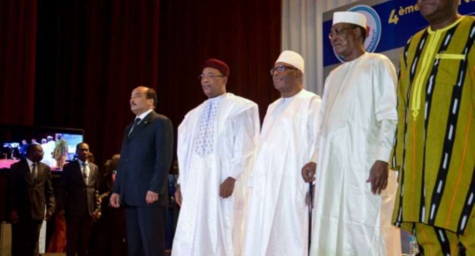 Mauritania's President Mohamed Ould Abdel Aziz, Niger's President Mahamadou Issoufou, Mali's President Ibrahim Boubacar Keita, Chad's President Idriss Deby and Burkina Faso's President Roch Marc Christian Kabore L to R attend a G5 Sahel summit in February 2018.  By BOUREIMA HAMA AFPFile