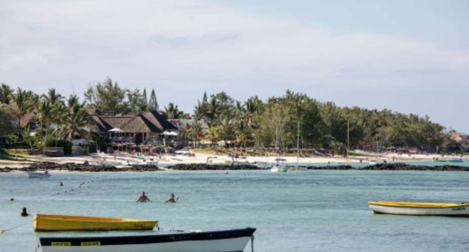 Mauritius, which has an established financial services industry, will host the credit rating agency.  By GIANLUIGI GUERCIA (AFP)
