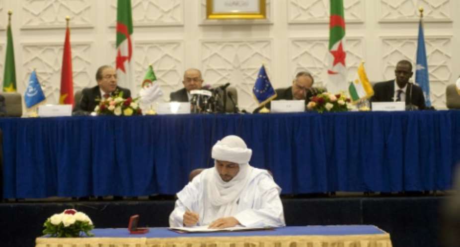 May 14 2015: The Malian government and rebel groups sign a peace accord in Algiers. But movement to implement the deal has been slow.  By FAROUK BATICHE AFP