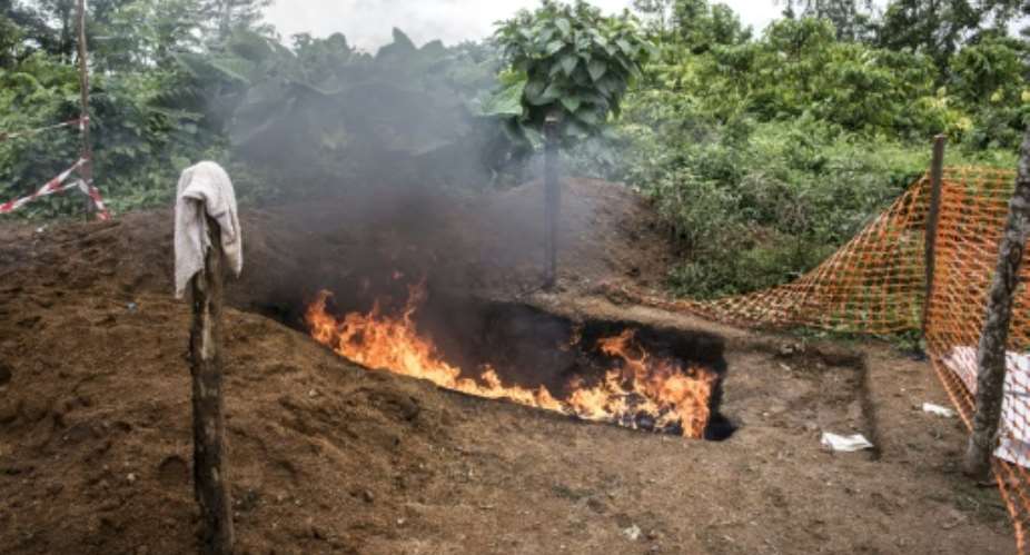 Measures against Ebola contagion include burning mattresses of the victims.  By John WESSELS AFPFile
