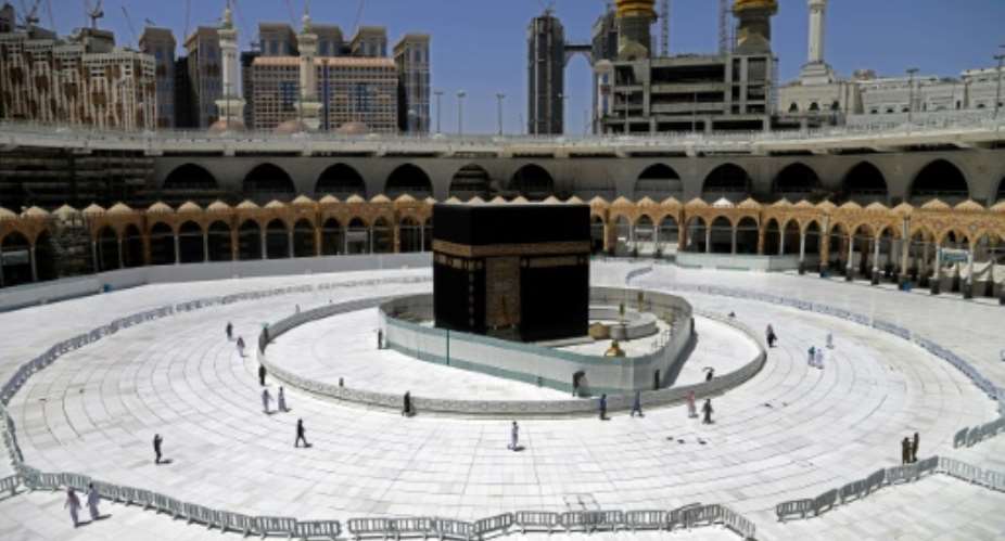 Mecca's Grand Mosque has been almost devoid of worshippers since March and Saudi Arabia is now under a five-day round-the-clock curfew after infections quadrupled since the start of Ramadan.  By Bandar ALDANDANI (AFP)