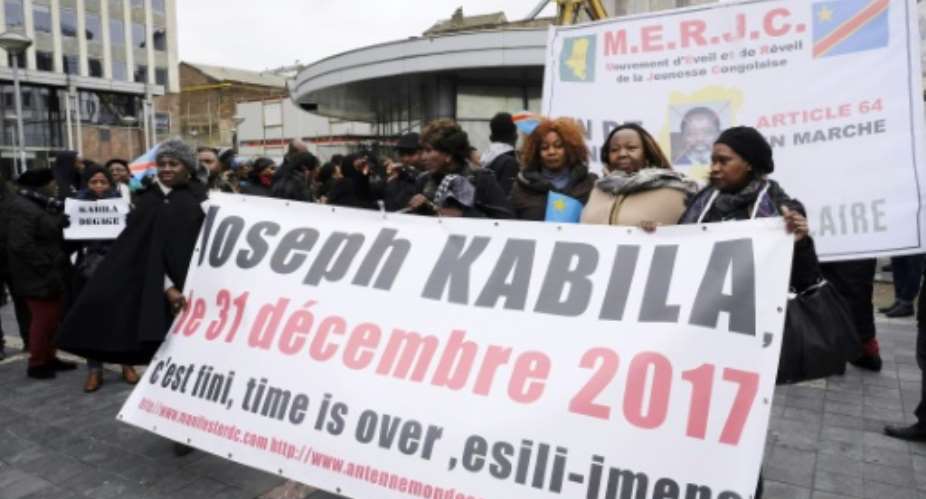 Members of Congolese associations held a rally in Brussels on Saturday urging  President Kabila to step down.  By NICOLAS MAETERLINCK BELGAAFP