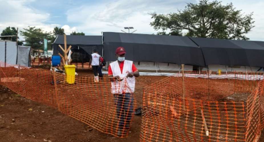 Members of Doctors Without Borders set up an Ebola treatment isolation unit at the Mubende regional hospital in Uganda amid an outbreak of of the deadly disease.  By BADRU KATUMBA AFP