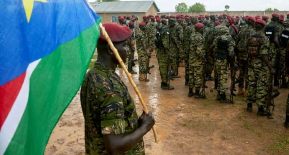 Members of South Sudan People's Defence Forces SSPDF, formerly named Sudan People's Liberation Army SPLA, assigned as South Sudan's presidential guard drill at their barracks just south of the capital Juba.  By Alex McBride AFP
