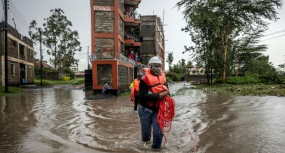 Members of the Kenya Red Cross have been involved in rescue efforts.  By LUIS TATO (AFP)